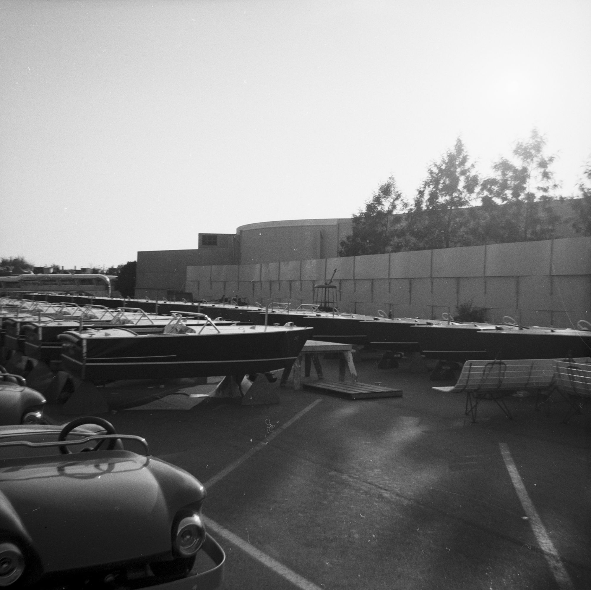 Backstage at Disneyland: boats and the service road behind the berm, 1959.